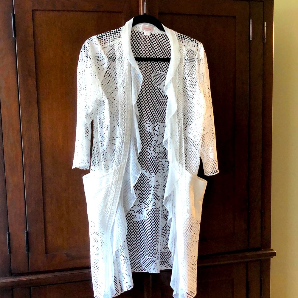 Kanan a white lace jacket